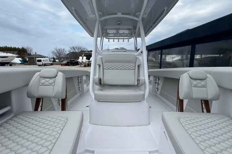 Slide: The Image of 2026 Jupiter 30 boat interior with modern seating and sleek design. - 51