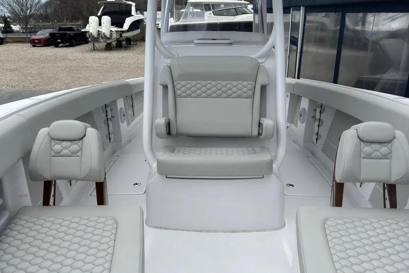 Slide: The Image of Interior of a 2026 Jupiter 30 boat with luxurious seating and modern design. - 52