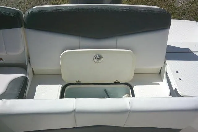 Slide: The Image of 2019 Robalo R207 Dual Console boat seating with storage compartment. - 39