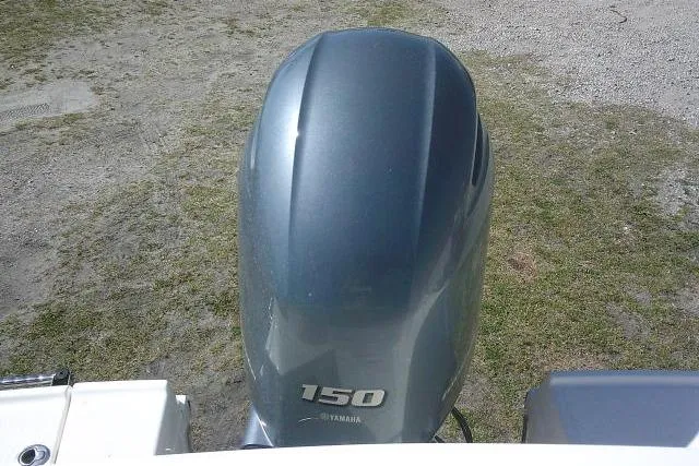 Slide: The Image of 2019 Robalo R207 Dual Console with Yamaha 150 outboard engine. - 48