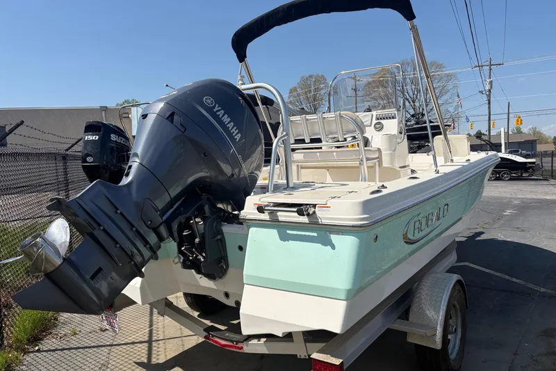 Slide: The Image of 2020 Robalo 206 Cayman boat with Yamaha outboard motor on a trailer. - 3