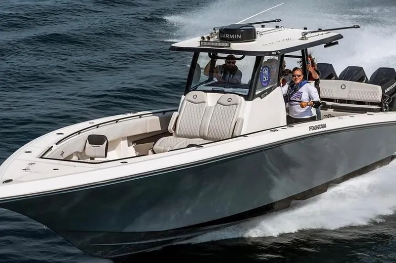 The Image of 2023 Fountain 38 CC Tournament Edition boat cruising on open water. - 0