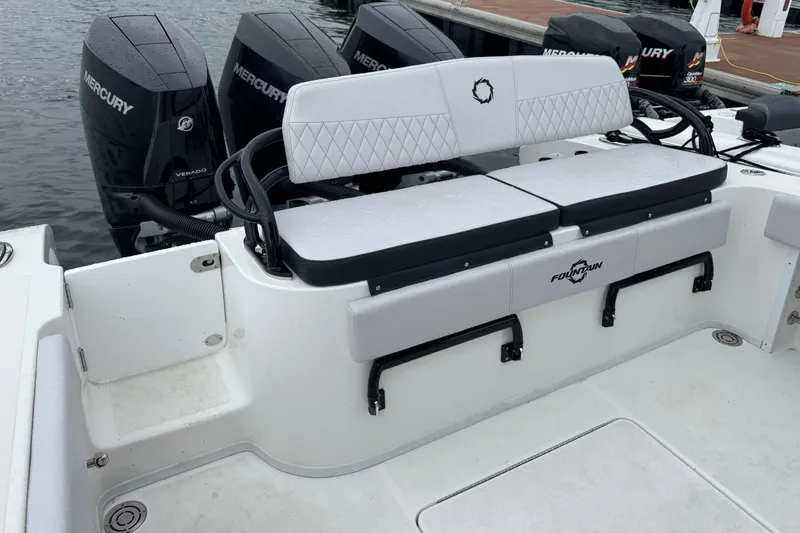 Slide: The Image of 2023 Fountain 38 CC Tournament Edition boat with Mercury engines at dock. - 19
