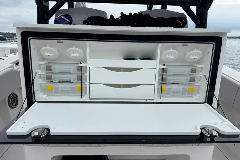Slide: The Image of Fishing tackle storage on 2023 Fountain 38 CC Tournament Edition boat. - 22