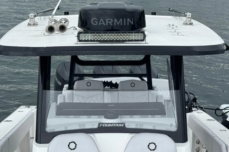 Slide: The Image of 2023 Fountain 38 CC Tournament Edition boat with Garmin equipment on open water. - 35
