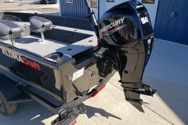 Slide: The Image of 2026 Alumacraft Classic 165 Tiller boat with Mercury 50 outboard motor. - 12
