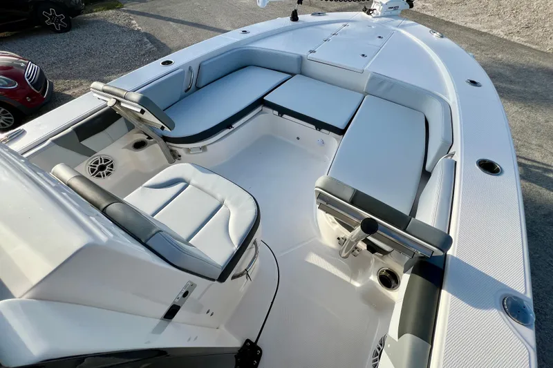 Slide: The Image of 2026 Robalo 246 Cayman boat interior with spacious seating and modern design. - 24