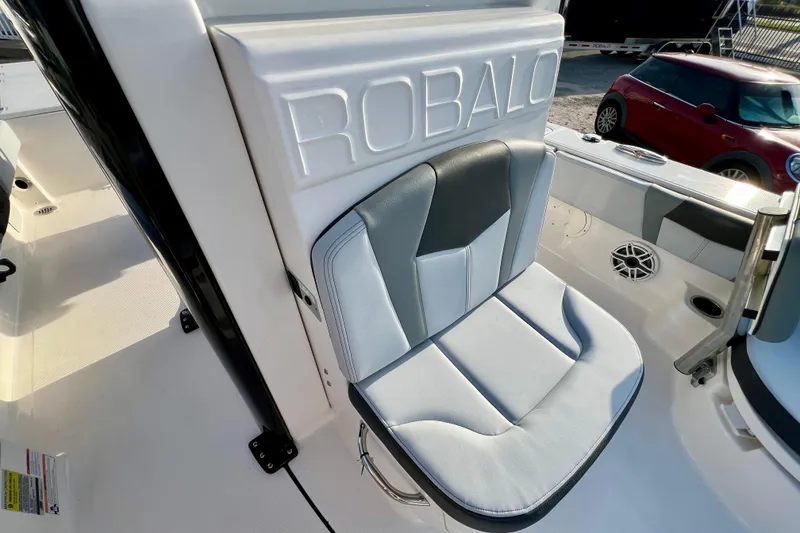 Slide: The Image of 2026 Robalo 246 Cayman boat seat with embossed logo and sleek design. - 25
