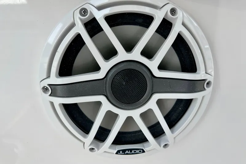 Slide: The Image of Close-up of JL Audio speaker on 2026 Robalo 246 Cayman boat. - 32