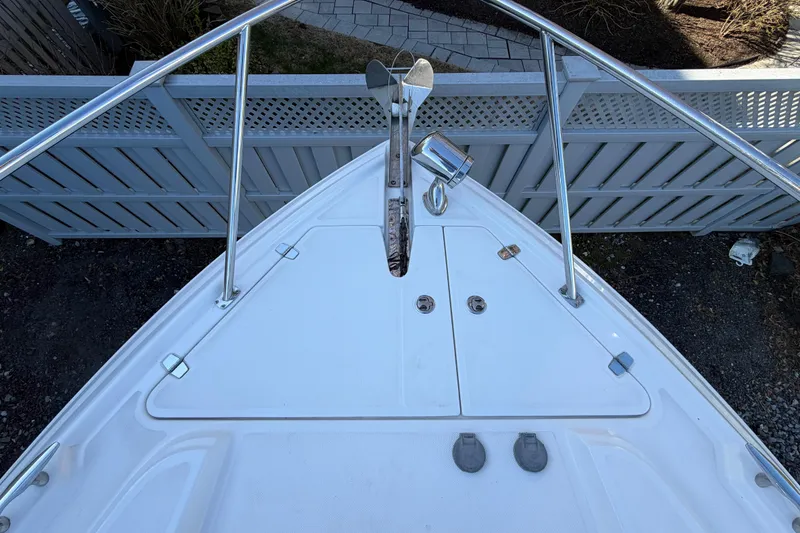 Slide: The Image of Bow view of 2013 Regal 35 Sport Coupe with anchor and railing. - 42