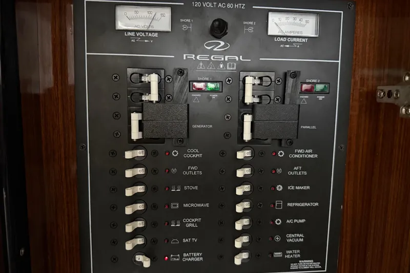 Slide: The Image of Electrical control panel of a 2013 Regal 35 Sport Coupe boat. - 47