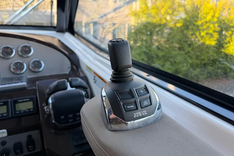 Slide: The Image of Control panel of a 2013 Regal 35 Sport Coupe with Volvo Penta joystick. - 49
