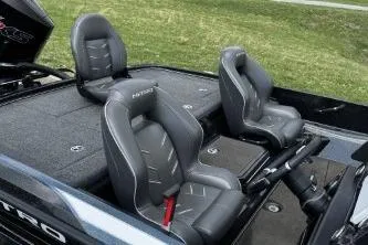 Slide: The Image of 2023 Nitro Z21 XL boat interior with sleek gray seating and modern design. - 4