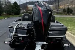 Slide: The Image of 2023 Nitro Z21 XL boat on trailer, rear view with powerful outboard motor. - 5