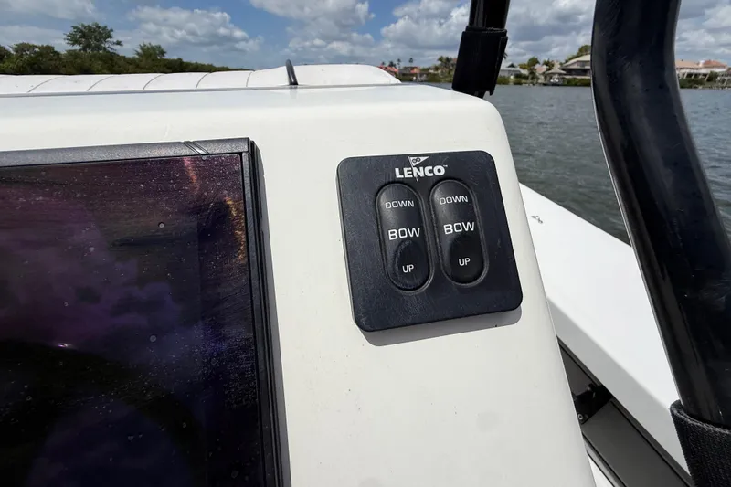 Slide: The Image of 2017 Beavertail Skiffs Lightning boat with Lenco trim tab controls on console. - 12