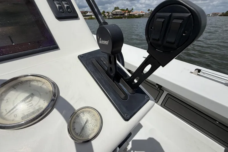 Slide: The Image of 2017 Beavertail Skiffs Lightning boat dashboard with Livorsi controls and gauges. - 13