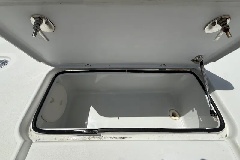 Slide: The Image of Open storage compartment on a 2017 Beavertail Skiffs Lightning boat. - 21