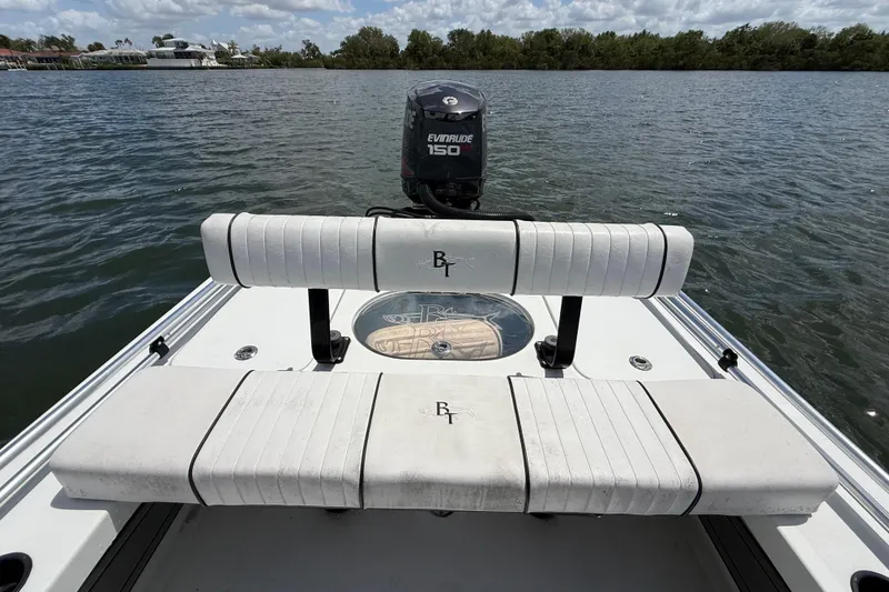 Slide: The Image of 2017 Beavertail Skiffs Lightning boat with Evinrude 150 engine on calm water. - 33