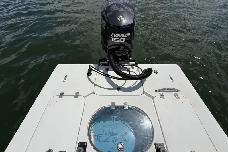 Slide: The Image of 2017 Beavertail Skiffs Lightning with Evinrude 150 engine on water. - 34