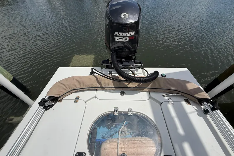 Slide: The Image of 2017 Beavertail Skiffs Lightning with Evinrude 150 engine on calm water. - 44