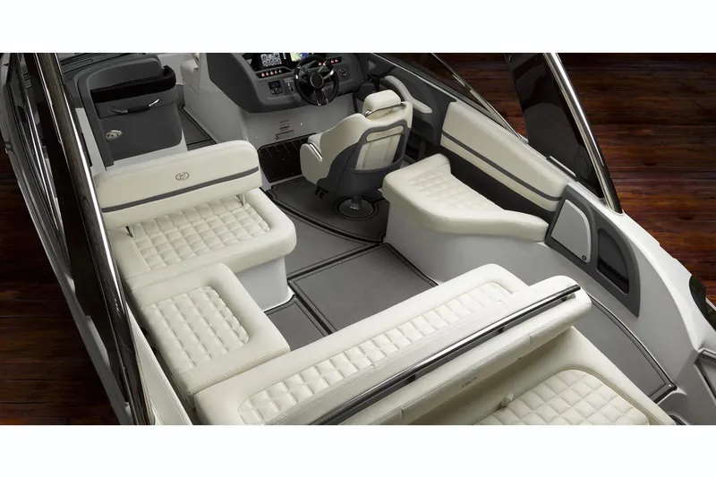 Slide: The Image of Manufacturer Provided Image: 2019 Cobalt R5 boat cruising on a lake with passengers enjoying the ride. - 10