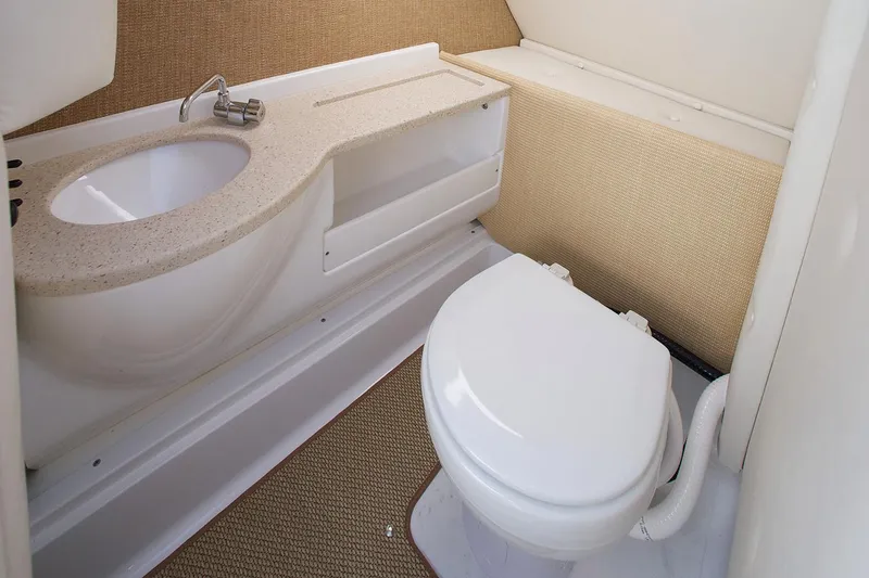 Slide: The Image of 2019 Cobalt R5 boat propeller and drive system on gravel surface. - 14