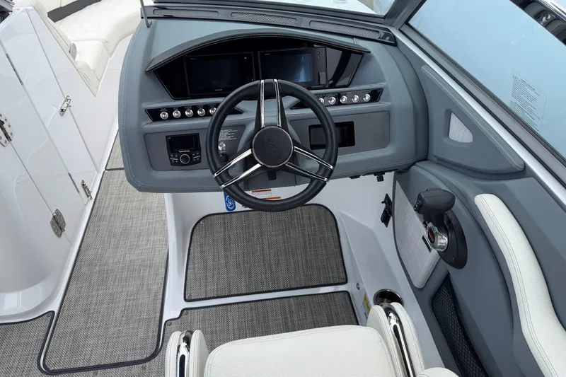 Slide: The Image of 2019 Cobalt R5 boat cockpit with steering wheel and control panel. - 4