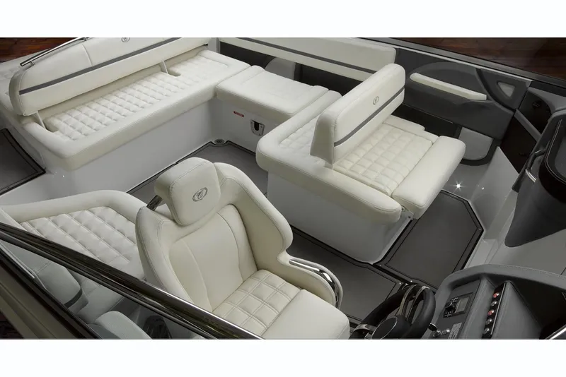 Slide: The Image of 2019 Cobalt R5 boat rear deck with cushioned seating and speakers. - 9