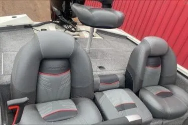 Slide: The Image of 2021 Tracker Pro Team 190 TX Tournament Edition boat seats with gray and red accents. - 3