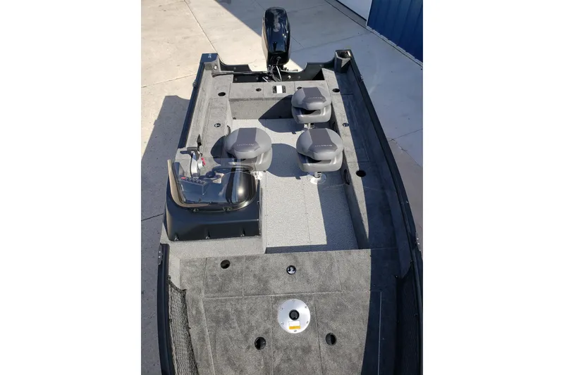 Slide: The Image of 2026 Alumacraft Classic 165 SC fishing boat interior with seating and storage compartments. - 11