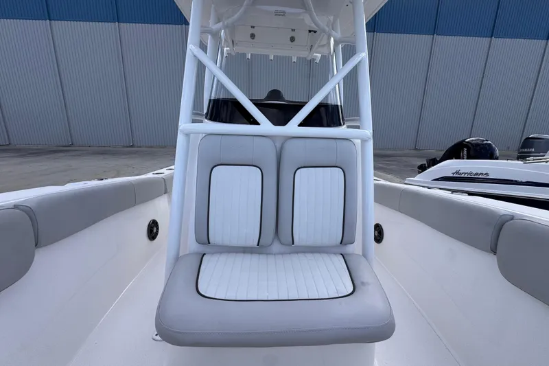 Slide: The Image of 2024 Sea Fox 248 Commander boat interior with cushioned seating and sleek design. - 15