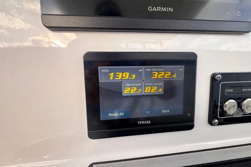 Slide: The Image of Yamaha display on 2024 Sea Fox 248 Commander showing fuel usage and trip data. - 18