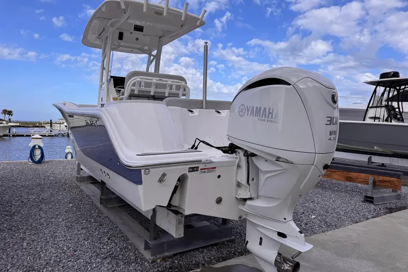 Slide: The Image of 2024 Sea Fox 248 Commander boat with Yamaha 300 engine at marina. - 5
