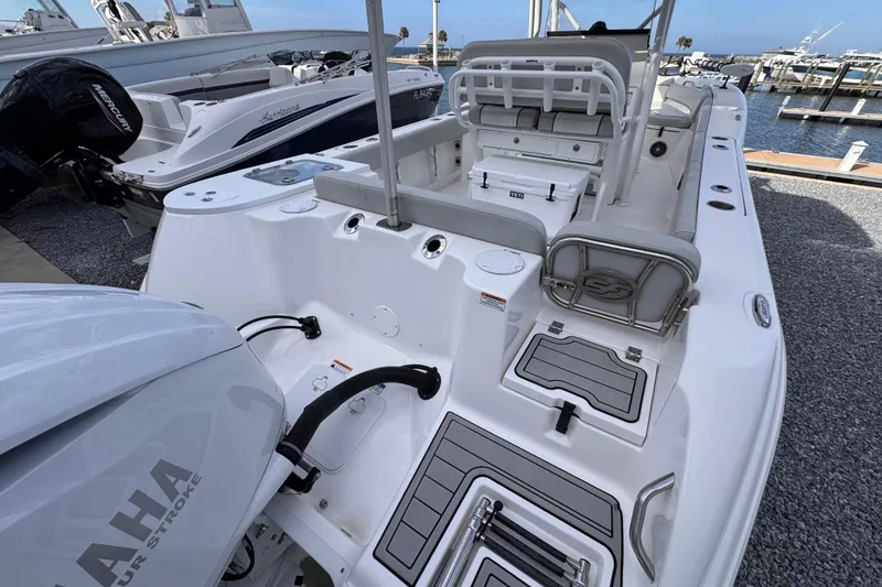 Slide: The Image of 2024 Sea Fox 248 Commander boat with Yamaha engine, docked at marina. - 7
