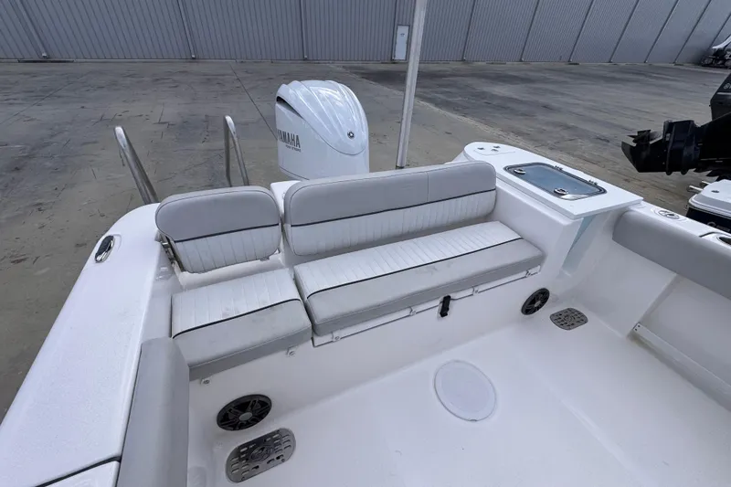 Slide: The Image of 2024 Sea Fox 248 Commander boat interior with seating and Yamaha engine. - 8