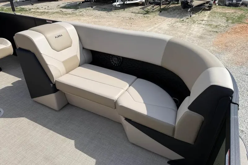 Slide: The Image of Luxurious seating on a 2026 Alera 22q boat, featuring beige upholstery and modern design. - 17