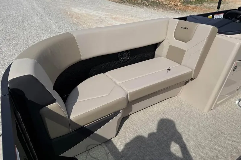 Slide: The Image of Luxurious seating on 2026 Alera 22q boat, featuring beige upholstery and modern design. - 18