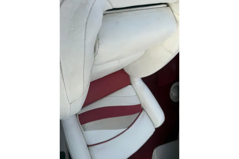 Slide: The Image of White and red boat seat interior of 1998 Larson Escape Delta-Conic. - 10