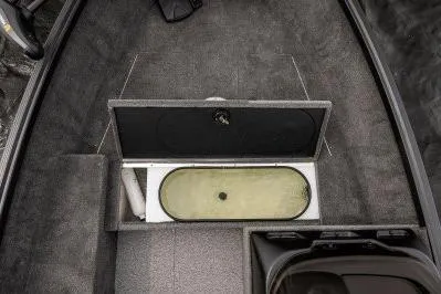Slide: The Image of 2026 Alumacraft Escape 165 CS boat interior with open storage compartment. - 20