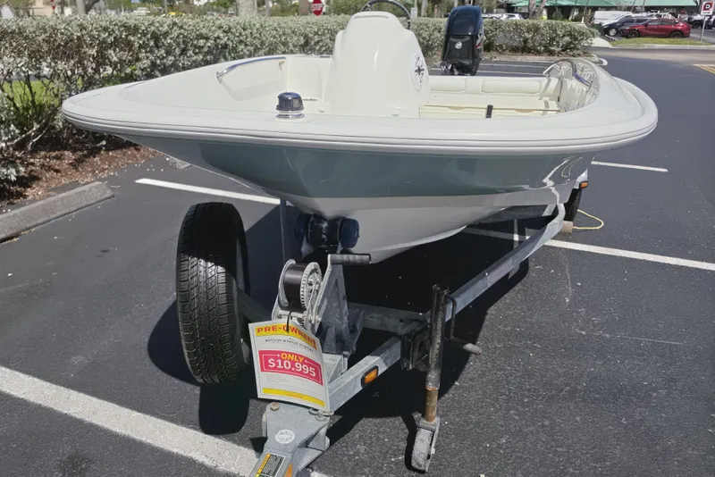 Slide: The Image of 2012 Boston Whaler 15 Super Sport boat on trailer, priced at $10,995. - 2