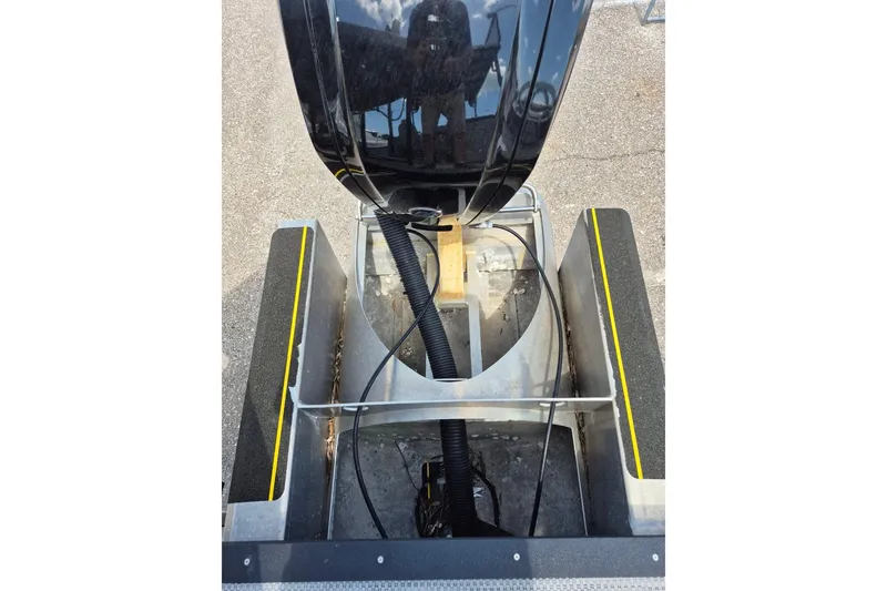 Slide: The Image of 2022 Sport Pontoons Tritoon Slide engine compartment with visible wiring and components. - 20