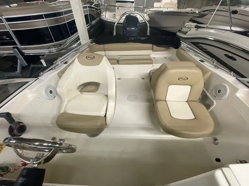 Slide: The Image of Interior of a 2013 Key West 203 DFS boat with beige seats. - 2