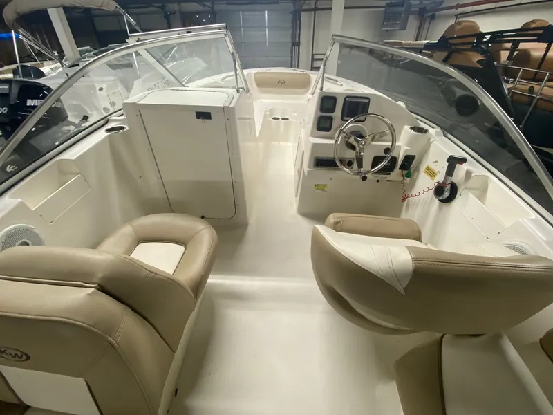 Slide: The Image of Interior of a 2013 Key West 203 DFS boat with beige seats. - 3