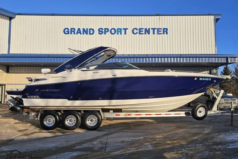 The Image of 2011 Monterey 328SS Super Sport boat on trailer at Grand Sport Center. - 1