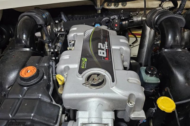 Slide: The Image of Engine of a 2011 Monterey 328SS Super Sport boat, featuring an 8.2 MAG motor. - 110