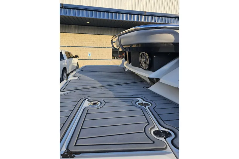 Slide: The Image of 2011 Monterey 328SS Super Sport boat deck with sleek design and modern features. - 23