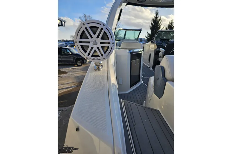 Slide: The Image of 2011 Monterey 328SS Super Sport boat interior with JL Audio speaker. - 32