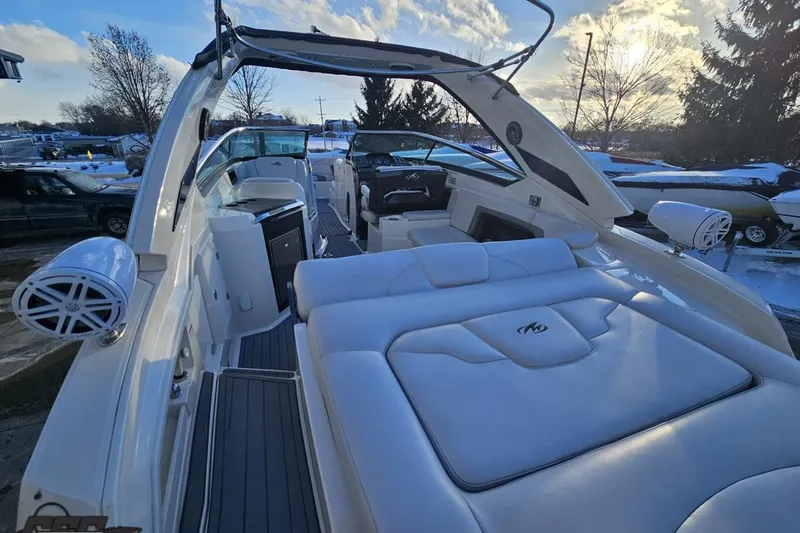 Slide: The Image of 2011 Monterey 328SS Super Sport boat interior with luxurious seating and modern design. - 33