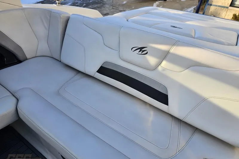 Slide: The Image of White leather seating on a 2011 Monterey 328SS Super Sport boat. - 38