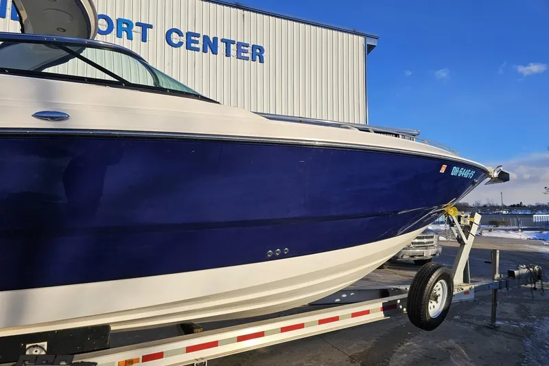 Slide: The Image of 2011 Monterey 328SS Super Sport boat on trailer at marina. - 4